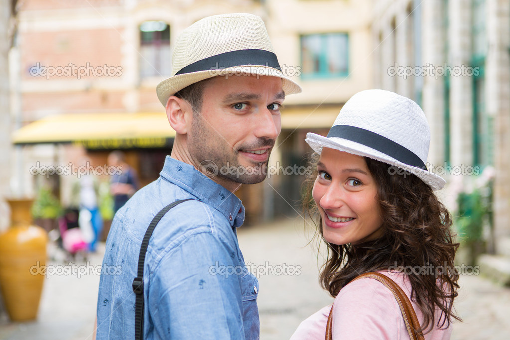 Young couple visiting city during holidays