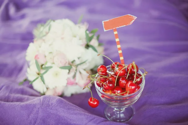 Wedding details, cherry and rings — Stock Photo, Image