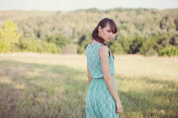 Woman in a field — Stock Photo, Image