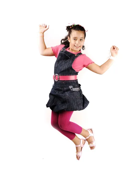 Happy little girl is jumping — Stock Photo, Image