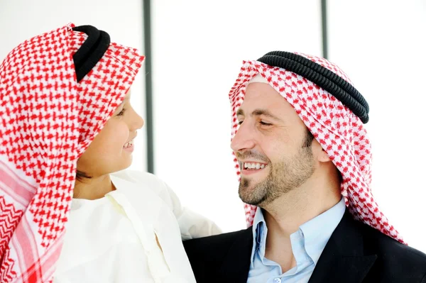 Arabic Muslim businessman with his son at office — Stock Photo, Image