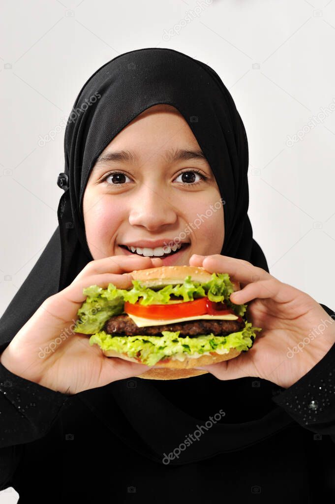 Arabian girl eating burger , high quality photos