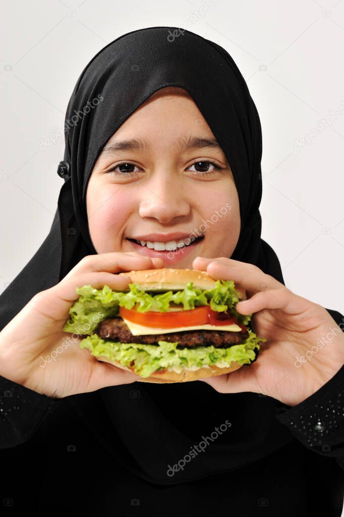 Arabian girl eating burger