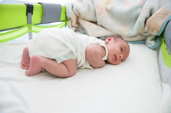 Newborn baby in bed — Stock Photo, Image