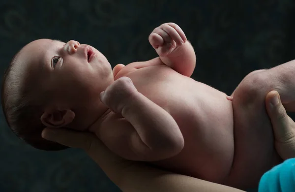 Newborn baby in arms — Stock Photo, Image