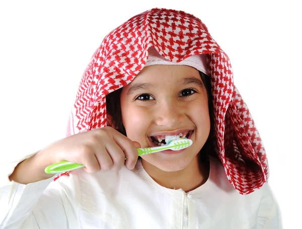 Arabic Muslim kid brushing teeth — Stock Photo, Image