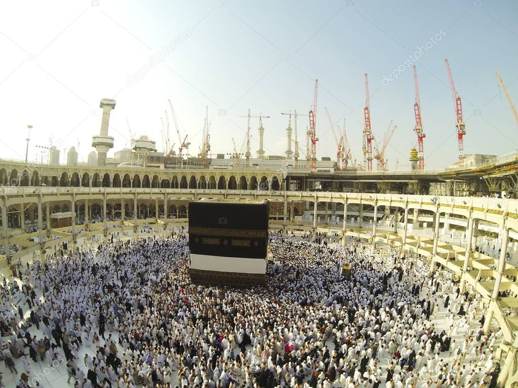Muslim people praying at Kaaba in Mecca