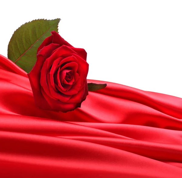 Rose auf roter Seide — Stockfoto