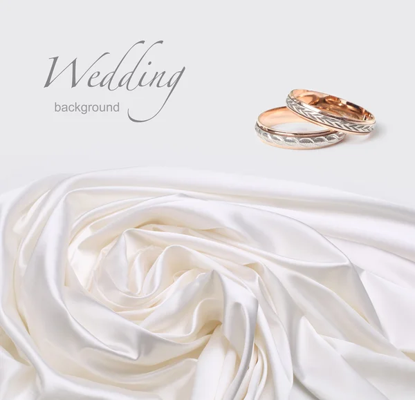 Wedding rings on silk background — Stock Photo, Image