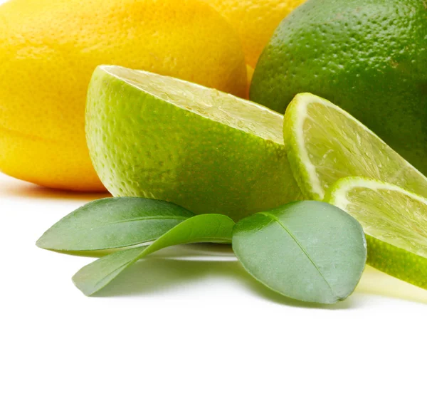 Lemon and lime with leaf — Stock Photo, Image