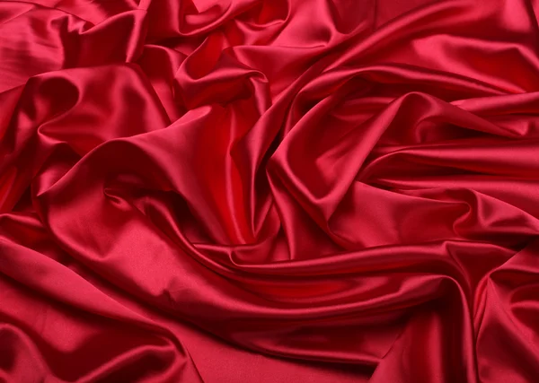 Röd silke tyg bakgrund — Stockfoto