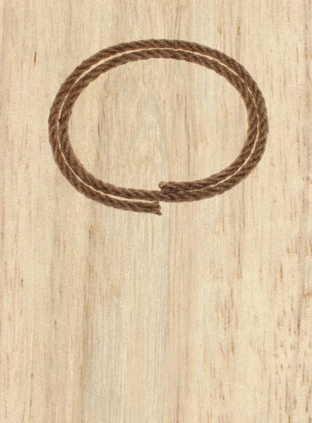 Bingkai tali pada latar belakang kayu — Stok Foto