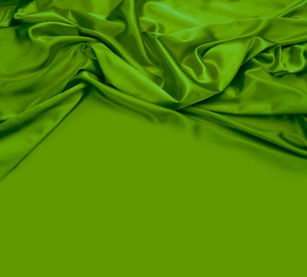 Green silk fabric background — Stock Photo, Image