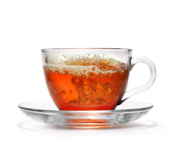 スプラッシュとお茶のカップ — ストック写真