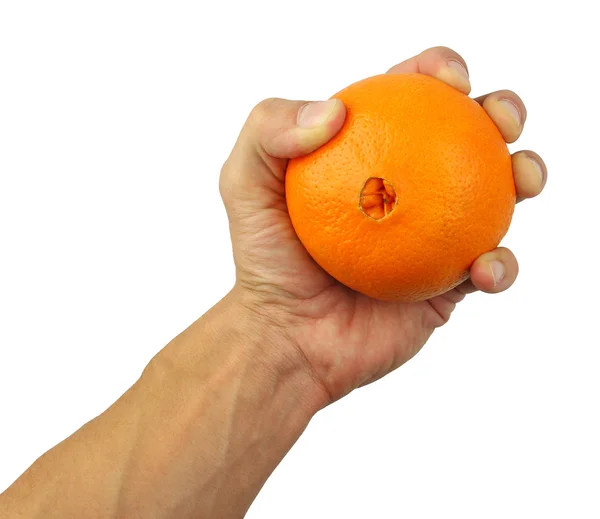 Человеческая рука, держащая апельсин — стоковое фото