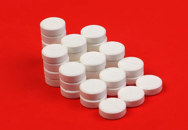 Many of round pills in form of pyramid — Stock Photo, Image