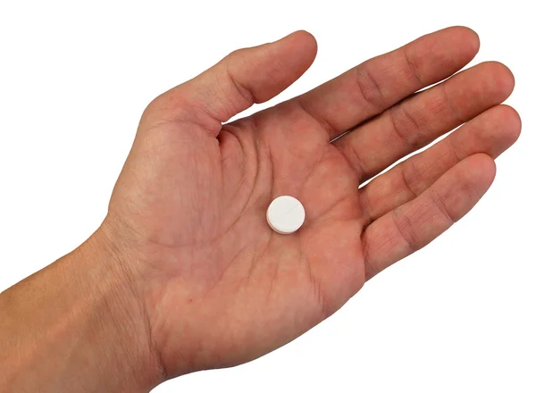 A hand with one pill — Stock Photo, Image