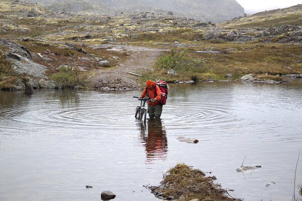 crossing the river at a ford with a bicycle