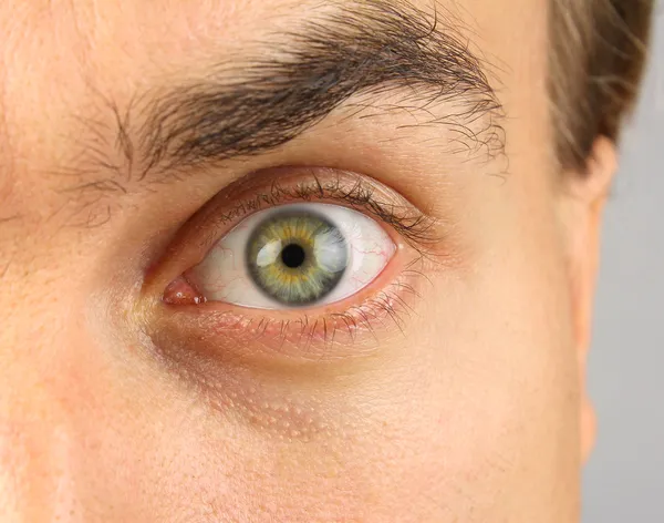 Male eye, menacing-looking — Stock Photo, Image