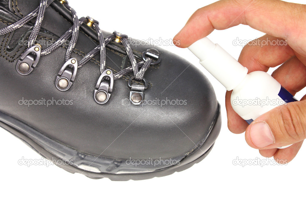 processing trekking shoe with a protective spray