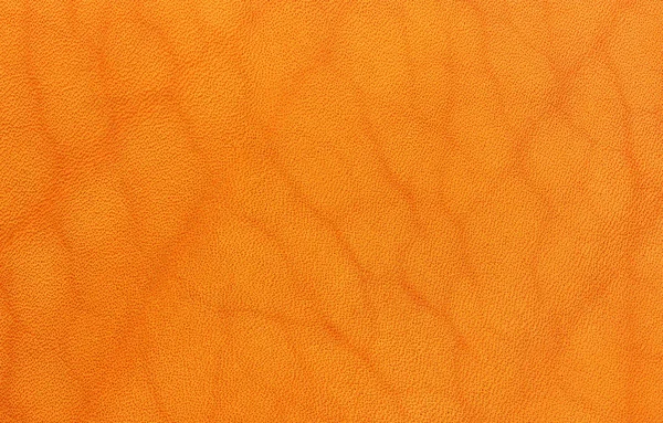 A piece of orange natural leather with texture — Stock Photo, Image