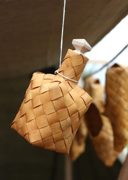 Bottle made of birch bark hanging by a thread — Stock Photo, Image