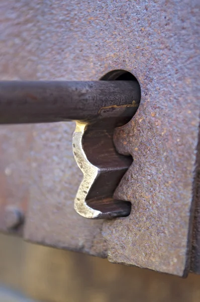 Old key in keyhole — Stock Photo, Image