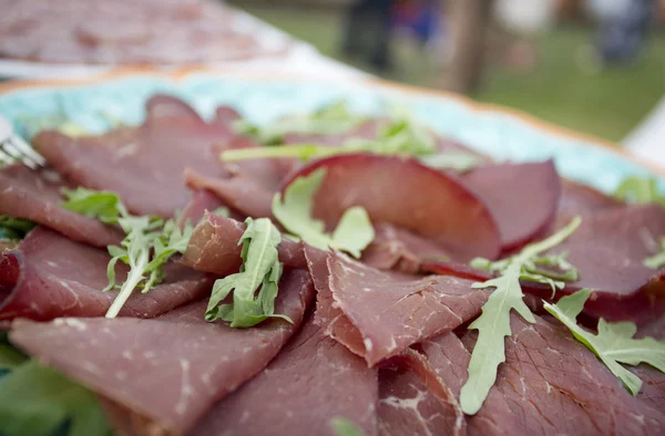 Slices of beef carpaccio — Stock Photo, Image