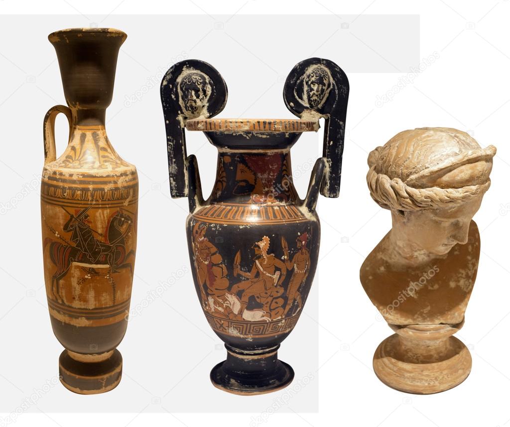 selection of old greek pottery on whitye backgrpound