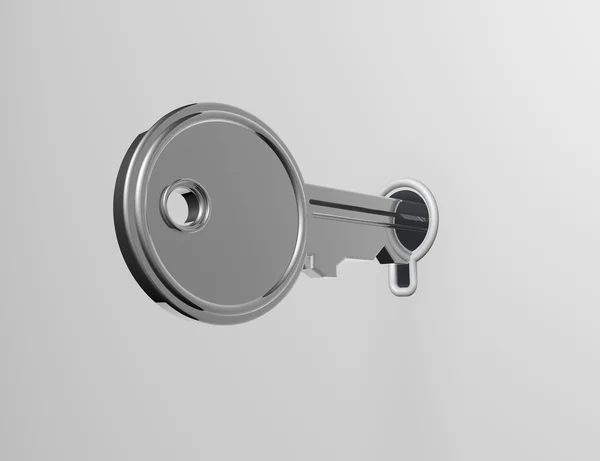 Nyckel låsa upp ett lås i en vit blank yta — Stockfoto