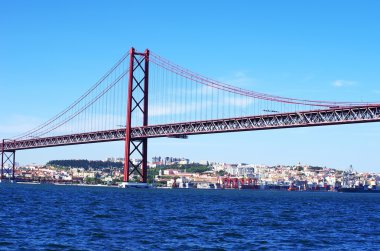 The traditional bridge over the river tagus (tejo) clipart