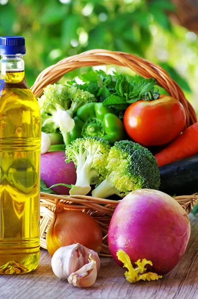 Vegetables and spices on wooden table — Stock Photo, Image