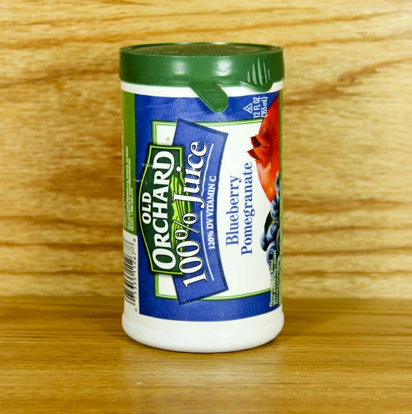 Container van oude orchardblueberry granaatappelsap — Stockfoto