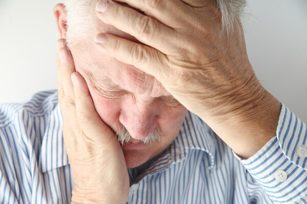 Mature man has severe headache