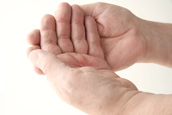 Man met handen palm naar boven — Stockfoto