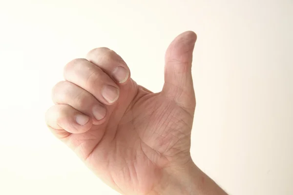 Hand gesture of thumb up — Stock Photo, Image