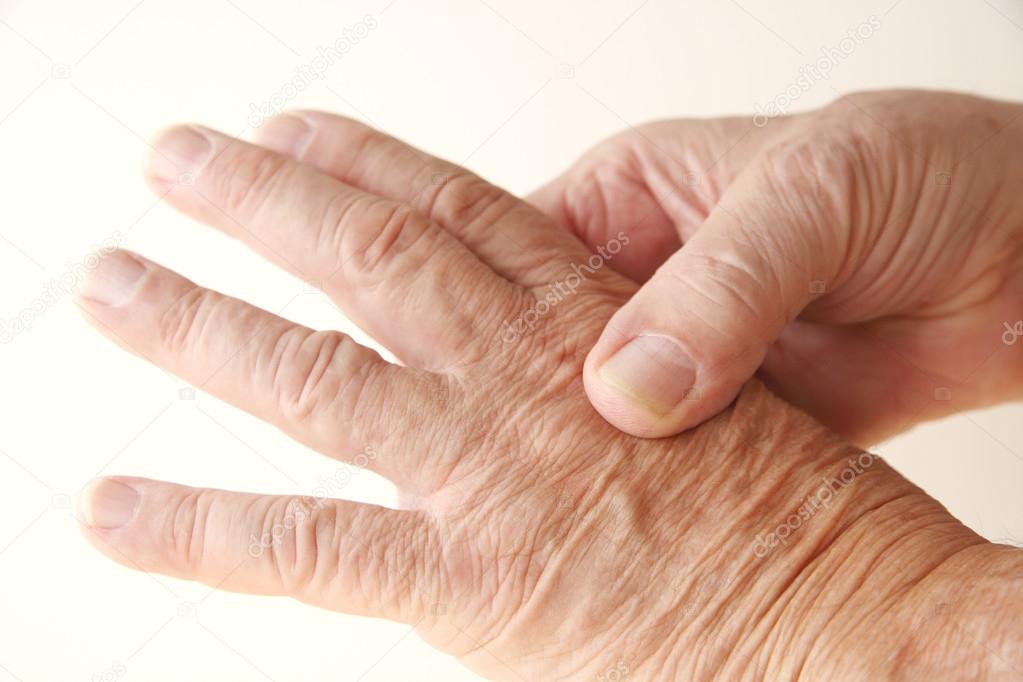 Aching knuckle on older man