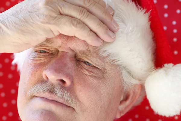 サンタがひどい頭痛 — ストック写真