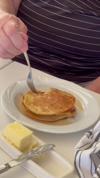 Senior Man Has Pancake Breakfast — Stock Video