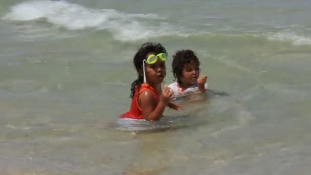 Two little girl in the sea — Stock Video