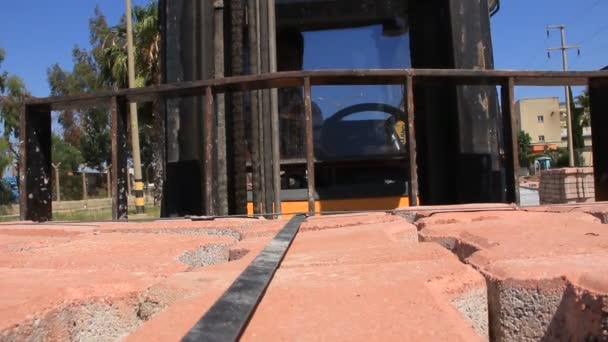 Forklift truck loader going with pavement dalles — Stock Video