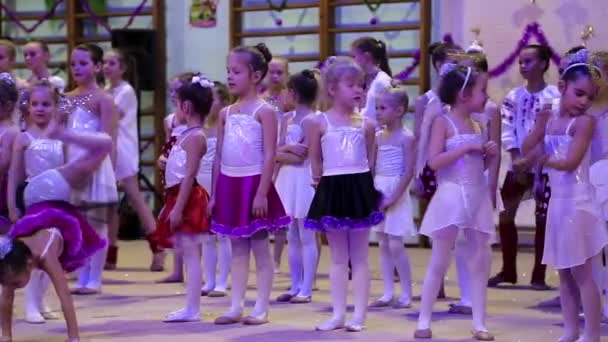 Young girls gymnasts at the New Year performance in school of gymnastics