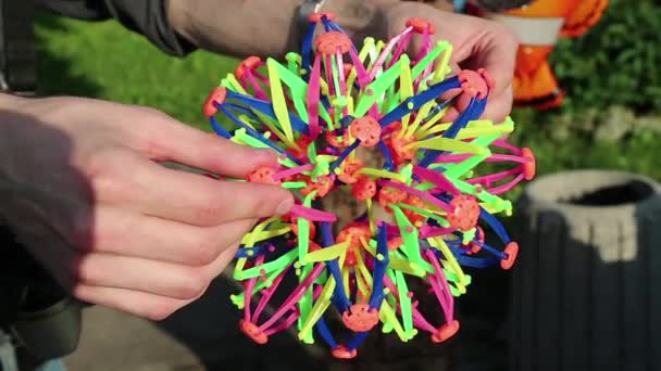 Homem com brinquedo colorido — Vídeo de Stock