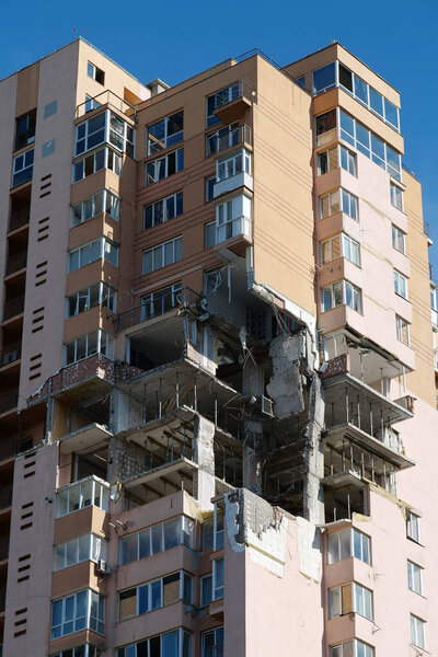 After bombing. Genocide of Ukrainian people. Russian terrorists damaged by missile dwelling house in Kyiv on February 2022. Russia - terrorist country, putin - terrorist number one in the world