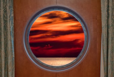 Sunset Through Porthole clipart