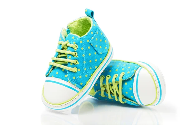 Zapatillas de deporte de bebé manchado — Foto de Stock