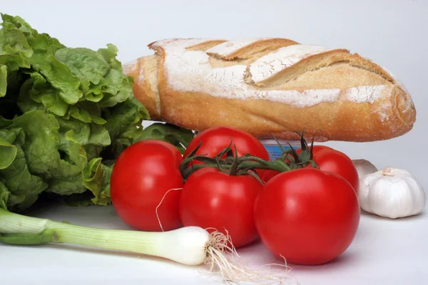 Composition with raw vegetables and bread — Stock Photo, Image