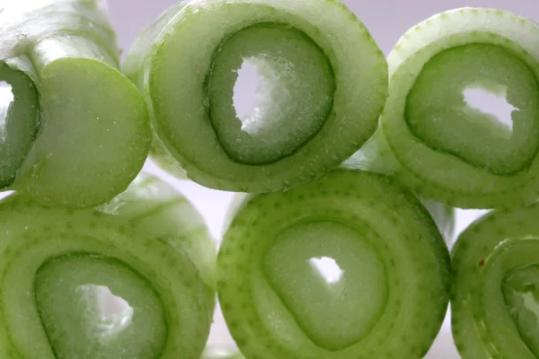 Slices of young onion — Stock Photo, Image