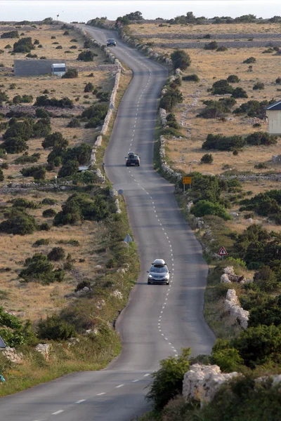 Asphalt winding road, Island of Pag, Croatia. — Stock Photo, Image