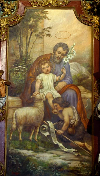 Saint joseph bedrijf baby jesus — Stockfoto